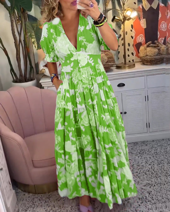 Catrisa - Kleid mit Blumenmuster, V-Ausschnitt und Taschen